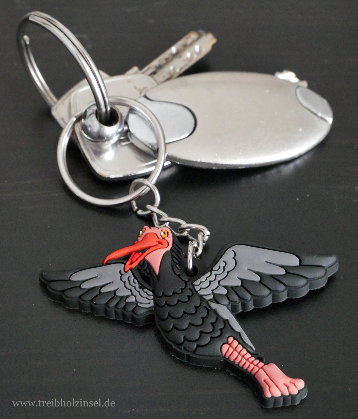 Schlüsselanhänger mit Waldrappmotiv als kleines Geschenk für die Patenschaft